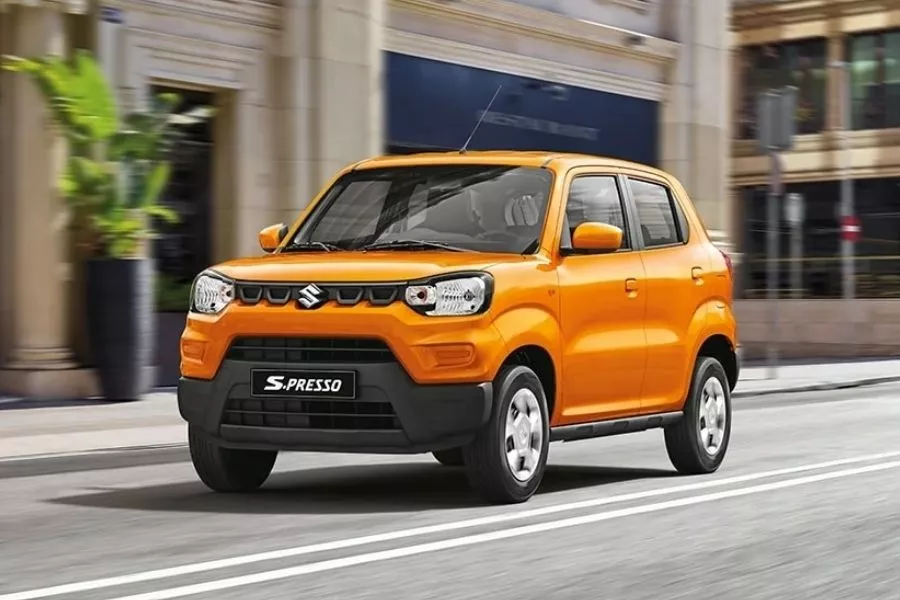 A picture of the Suzuki S-Presso on a city road