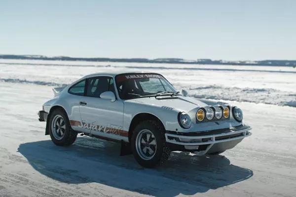 A picture of the 911 TX driving on a frozen lake