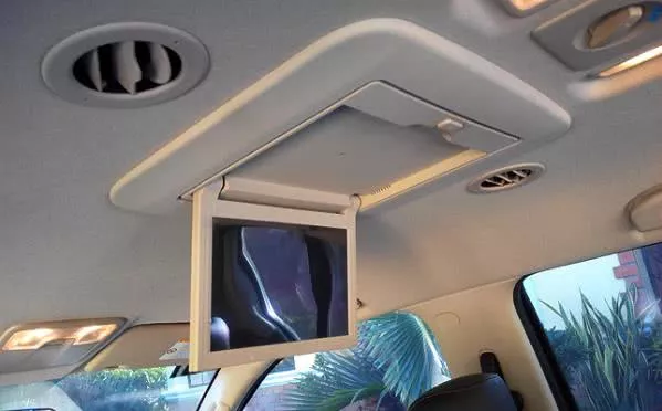 a 10-inch screen mounted on the ceiling of the Isuzu MU-x