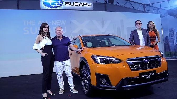 An orange Subaru XV on display