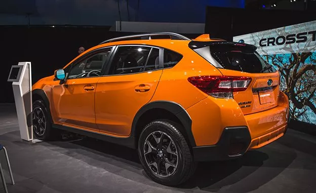 The new XV is designed based on the new Subaru Global Platform An orange Subaru XV rear view