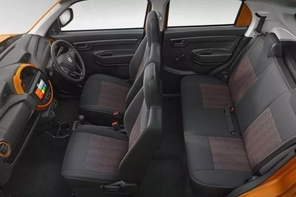 Uncluttered, very simple, but due to that dash, it does have character A picture of the interior of the Suzuki S-Presso