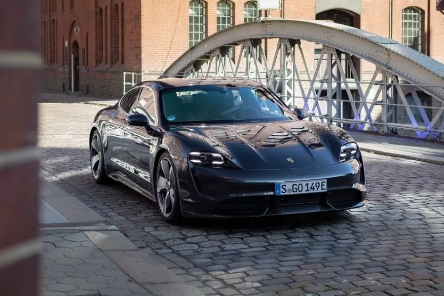 A picture of the Porsche Taycan on a European road