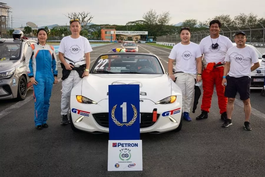 A picture of Team Mazda Philippines together with the Mazda MX-5