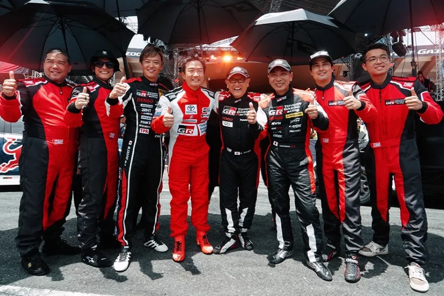 A picture of TGR racers and TMC chairman Akio Toyoda