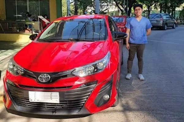 A picture of a nurse with one of the Toyota Vios units TMP lent 