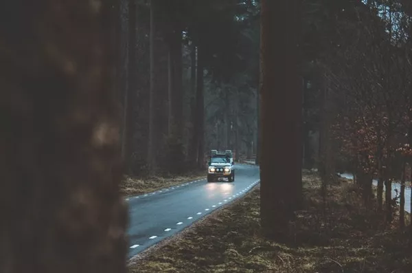 A car going though the wood