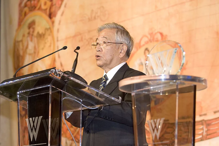 A picture of Toyoda giving a speech for the Woodrow Wilson award.