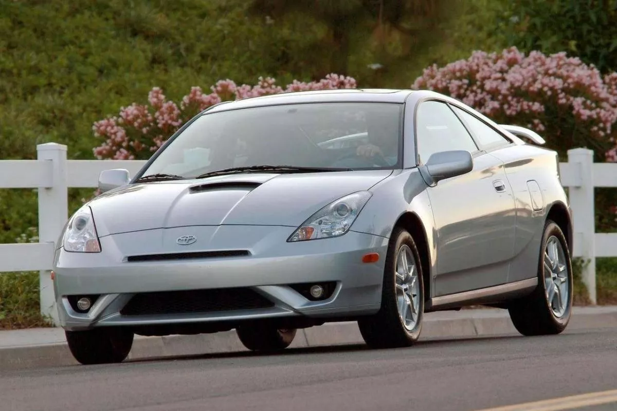 A picture of the seventh-gen Toyota Celica on the road.