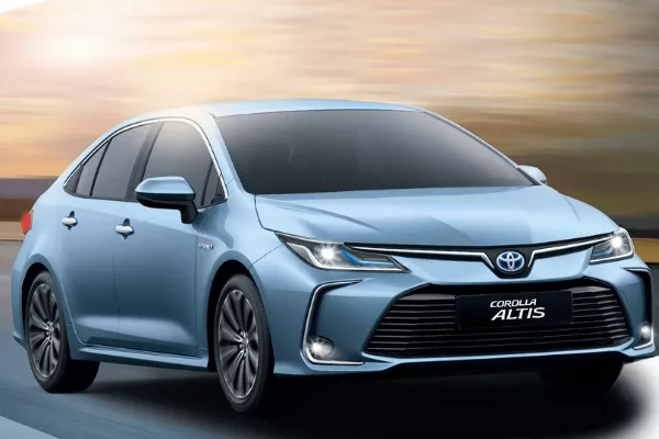 Toyota Corolla driving on the streets