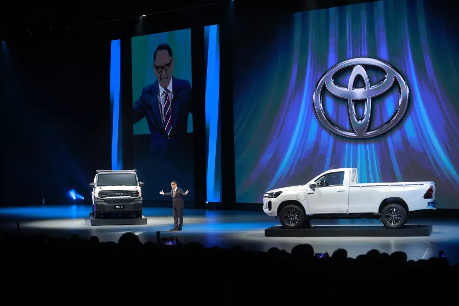 Toyota President Akio Toyoda with the Hilux Revo BEV and IMV 0 concepts