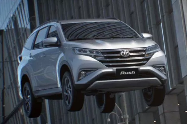 A picture of the Toyota Rush jumping in the city