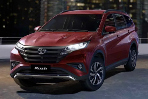A red Toyota Rush