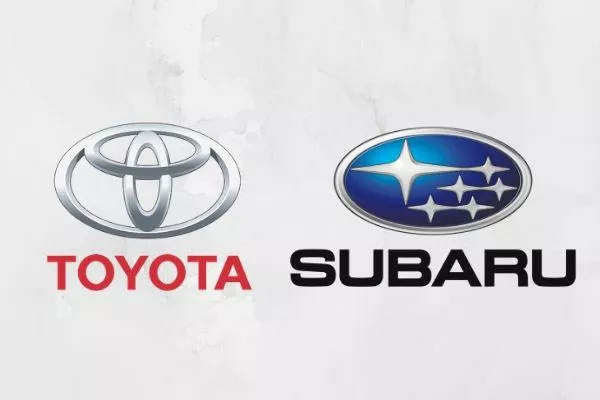 A picture of the Toyota logo and Subaru logo side by side