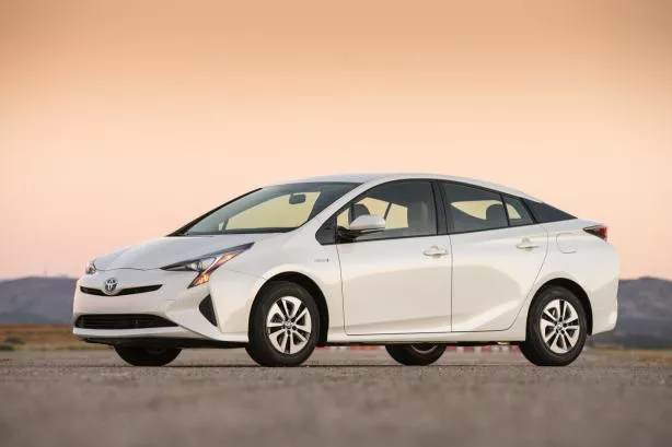 Angular front of a white Toyota Prius 