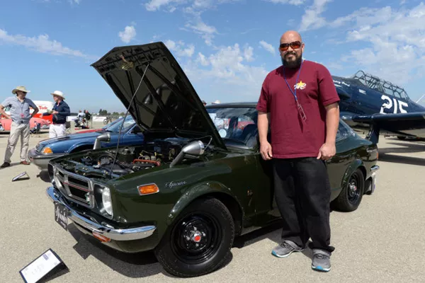 A picture of a 1972 Sprinter Trueno with Mike Muniz