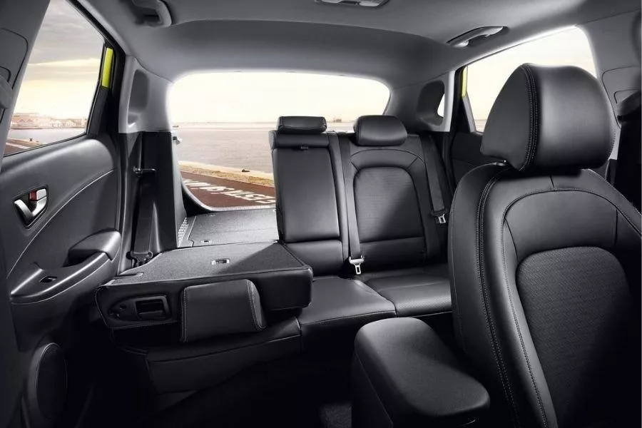 A picture of the interior of the Kona with some of the rear seats down.