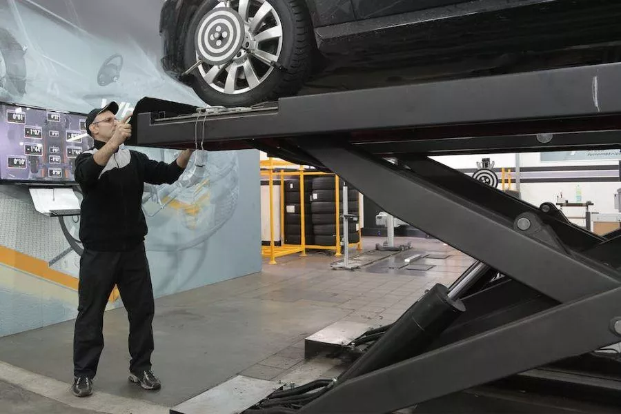 Car mounted on lift Car mounted on lift