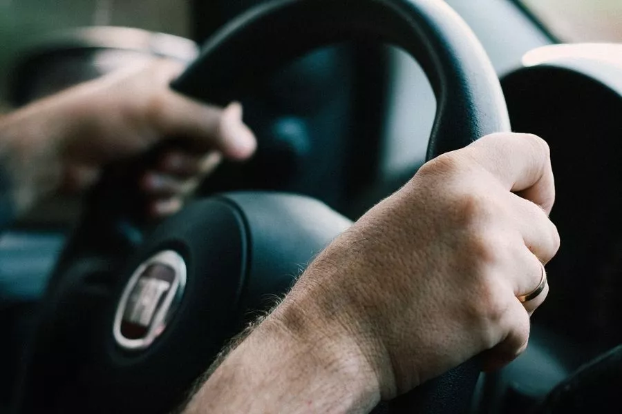 Hands on steering wheel