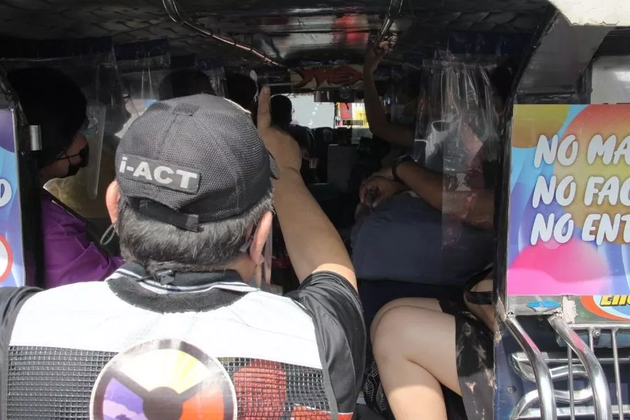 Enforcer monitoring jeepney Enforcer monitoring jeepney