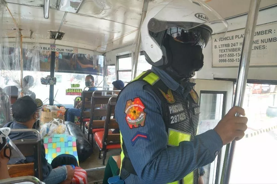 Police officer in bus 