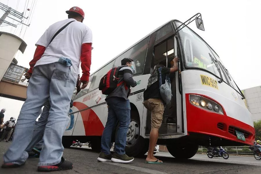 Passengers boarding bus 