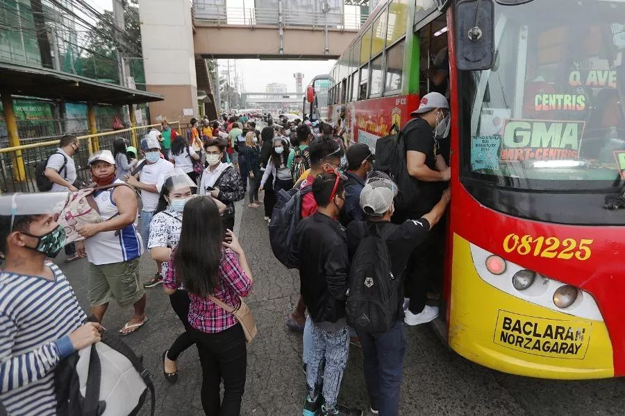 Passengers boarding bus