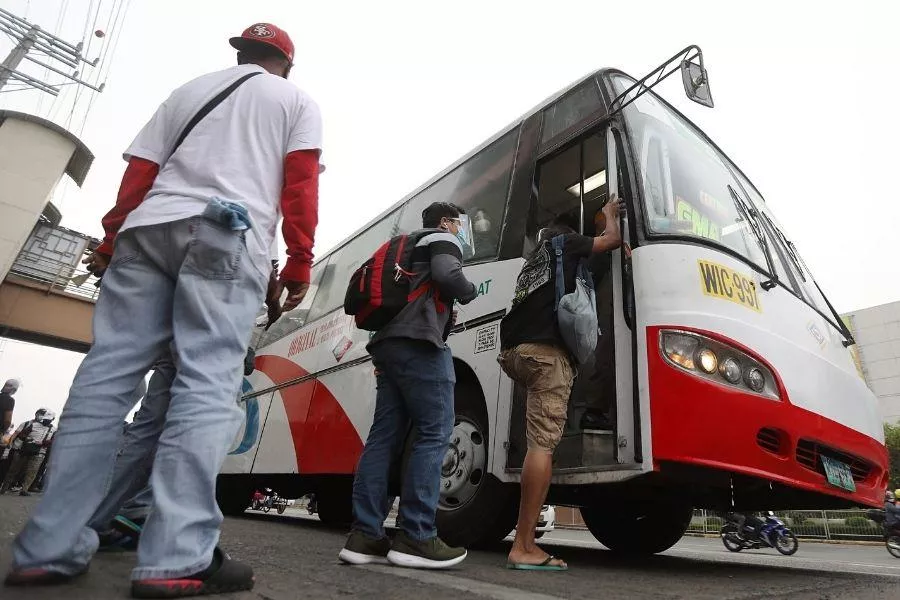 Passengers boarding bus