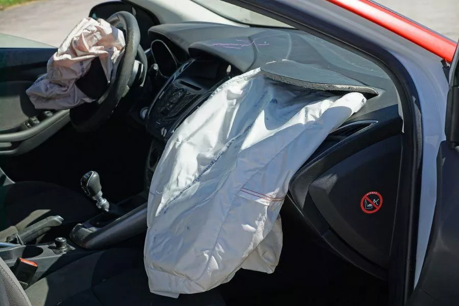 Car crash interior with airbags deployed