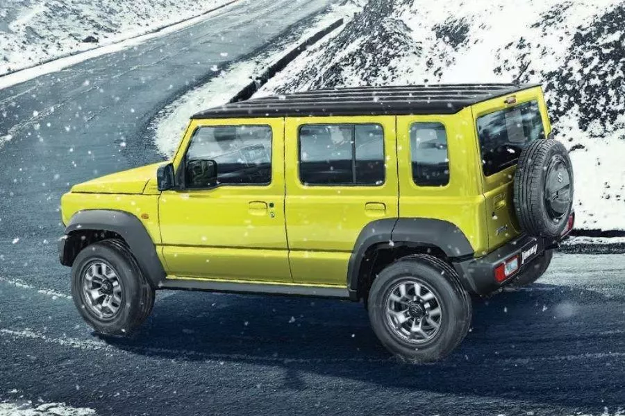 It is longer and greener Suzuki Jimny side view