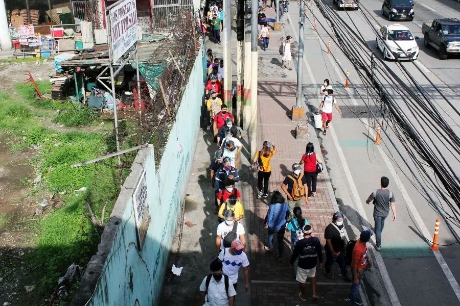 Waiting commuters Waiting commuters