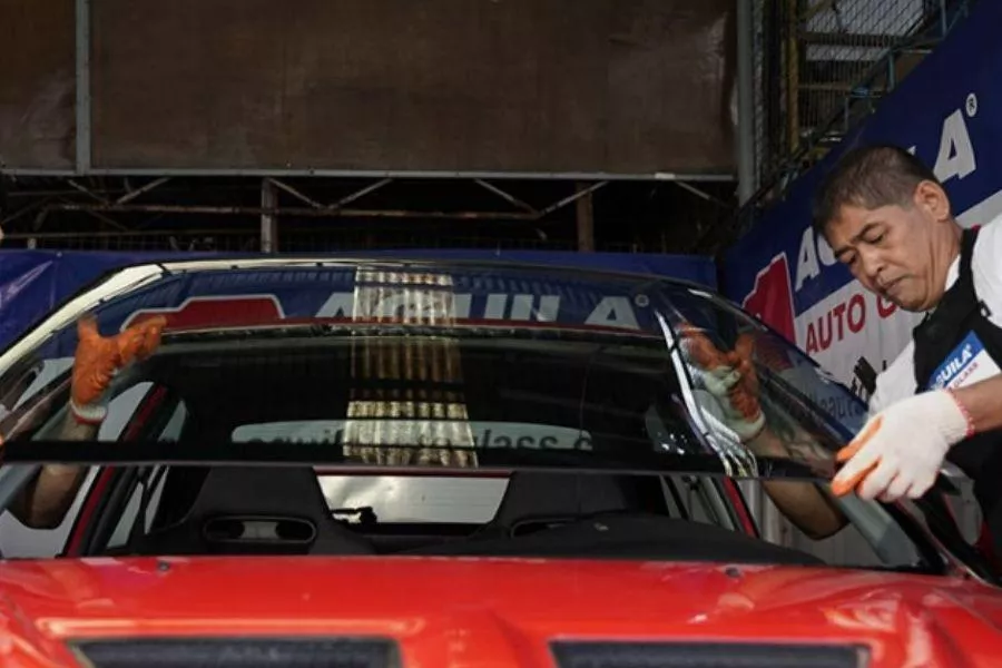 Aguila technicians installing glass 