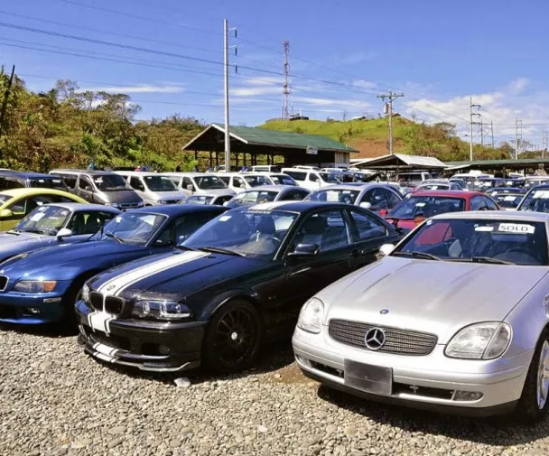 Cars parked in a small ground