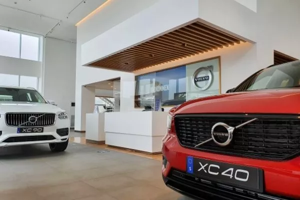 Two Volvo cars in a showroom