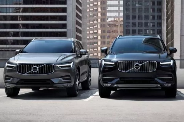 A picture of Volvo models parked in an open air parking lot