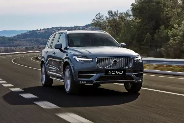 A Volvo XC90 running down a road