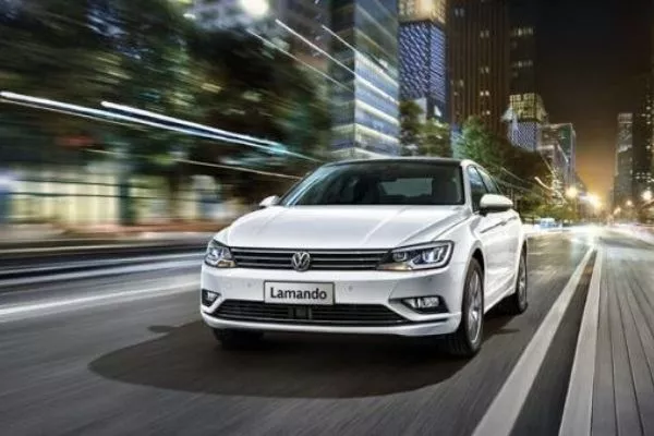 VW Philippines sells cars like the Lamando, the Santana, Lavida, and the Tiguan A picture of the VW Lamando on a city road at night