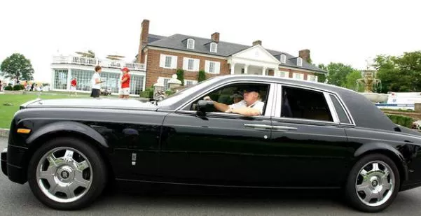 Trump driving in his 2015 Rolls-Royce Phantom 