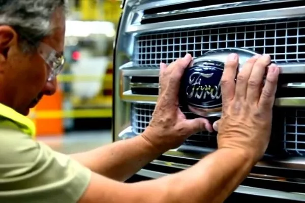 Worker placing badge