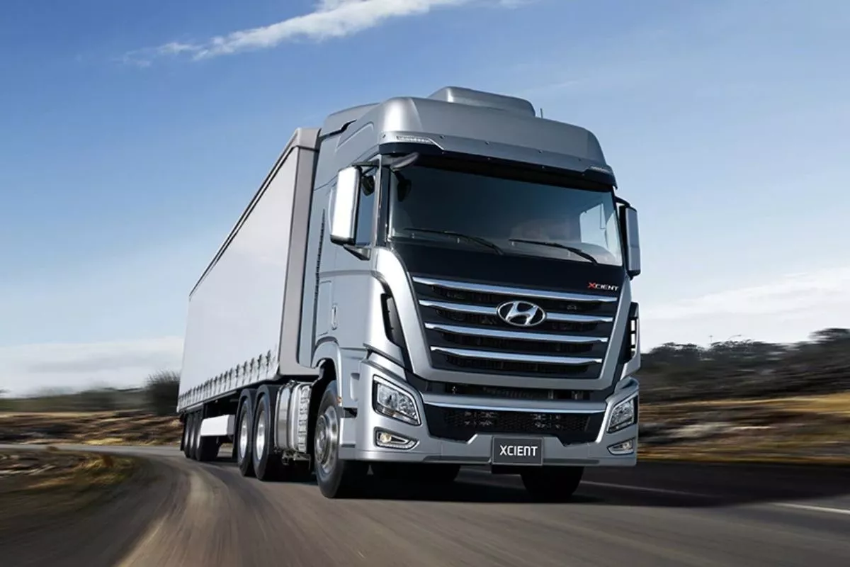 A picture of the Hyundai Xcient on the road.