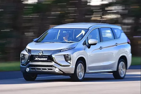 A picture of a Mitsubishi Xpander travelling on a road