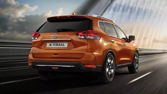 An orange Nissan X-Trail 2018 angular rear view