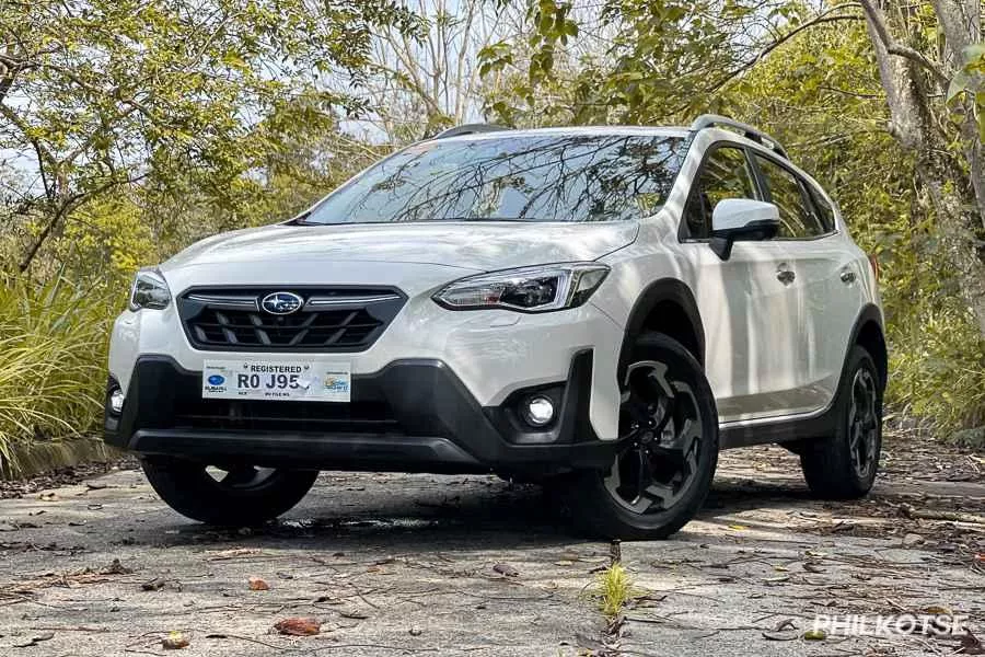 A picture of the Subaru XV parked near some trees