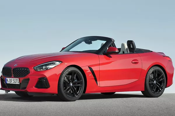  a red BMW Z4 2019 parked on the side of a road