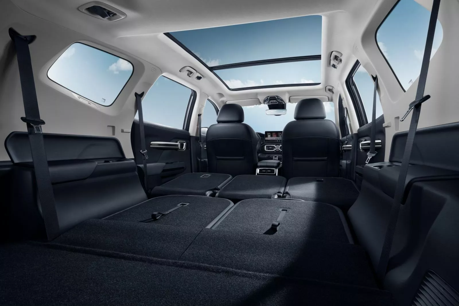 The folded seats combined with the sunroof give an airy feeling Okavango seats folded