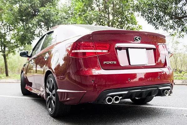 You can customize your exhaust pipe for a sharper appeal A red car with quad exhaust pipes