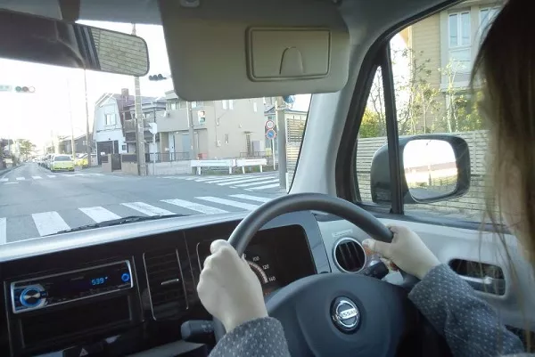 Japanese woman behind the wheel