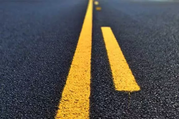 The broken lines can either be white or yellow. A picture of a solid yellow line with broken yellow lines.