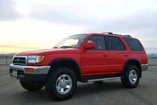 A picture of a red Toyota 4runner