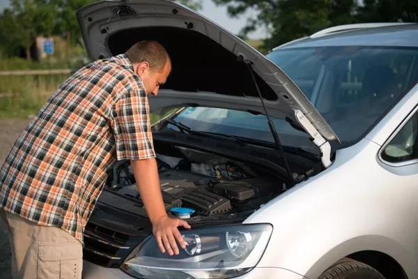 Man checking the engine